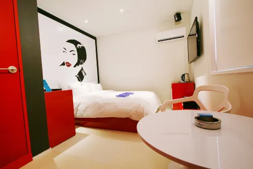 Guri Lexy Hotel Chambres Photos