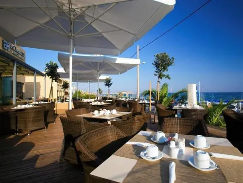 Atlantis Beach Hotel Restauration Photos