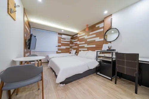 HY Realty Hotel Rooms Photos