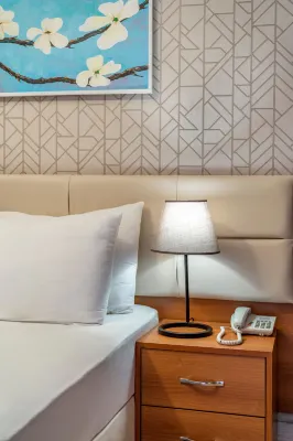 URAS BEACH HOTEL Chambres Photos