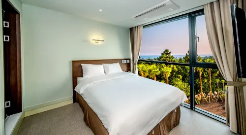 Sunrise Hotel Jungmun Branch Chambres Photos