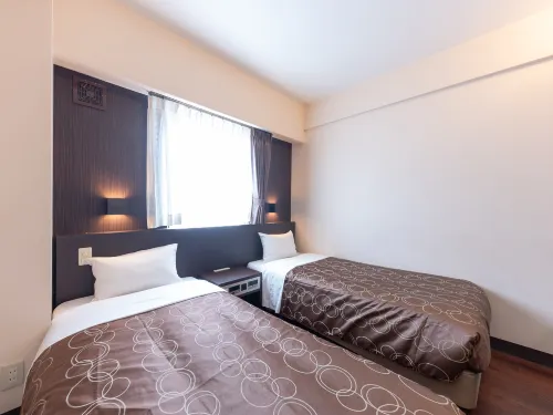 OYO City Hotel Higashimatsuyama Zimmer Photos