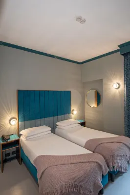 Hotel Milani Rooms Photos
