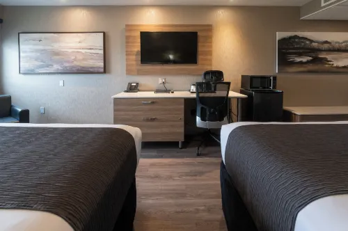 Hôtel & Suites le Dauphin Québec Chambres Photos