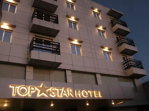 Top Star Hotel Chambres Photos