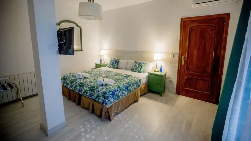 Hostal Escala Suites Chambres Photos