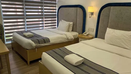 Queen Margarette Hotel - Downtown Rooms Photos