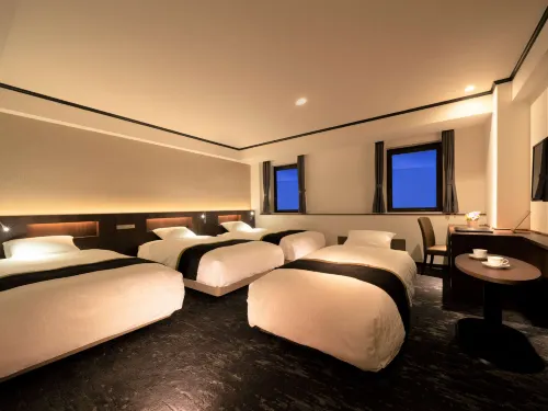 PRINCESS GARDEN HOTEL Chambres Photos