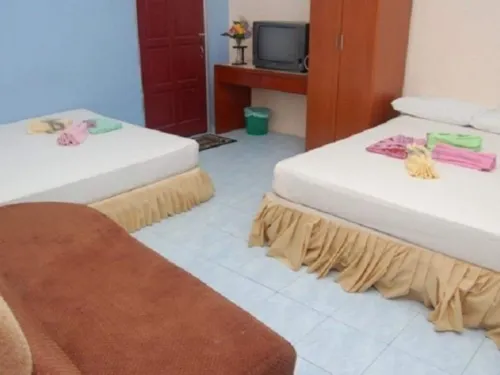 Kawana Tourist Inn Kamar Photos