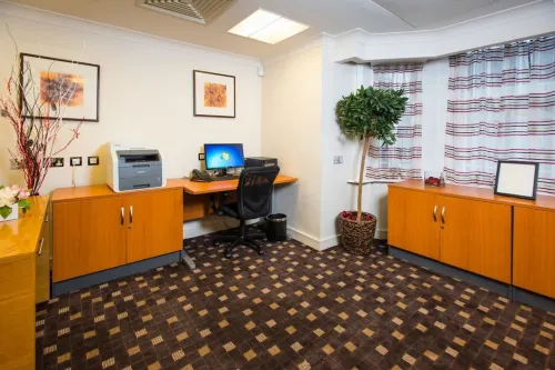 The Park City Grand Plaza Kensington Hotel Business Photos