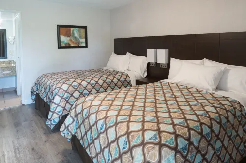 Deluxe Inn Chambres Photos
