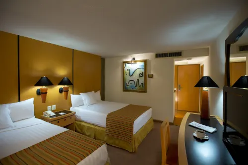 Hotel Guadalajara Plaza Ejecutivo Zimmer Photos