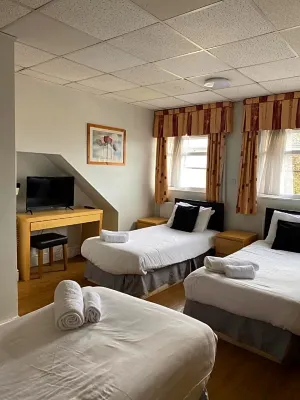 Whites Hotel Camere Photos