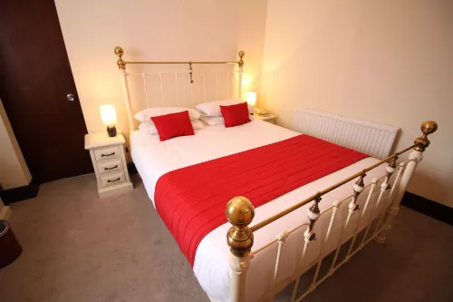 Pilgrims Hotel Huoneet Photos