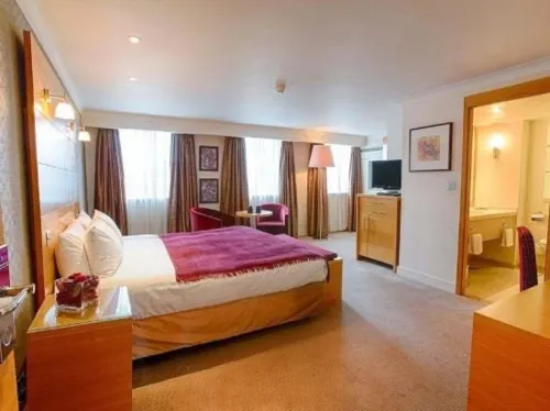 The Park City Grand Plaza Kensington Hotel Camere Photos