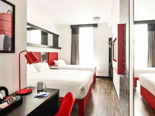 Essence Hotel Carlton Zimmer Photos