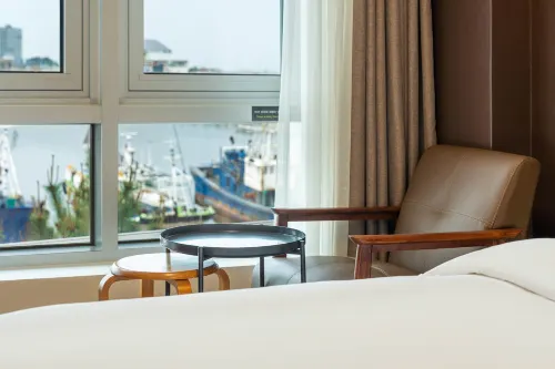Chungchoho Best Hotel Номера Photos