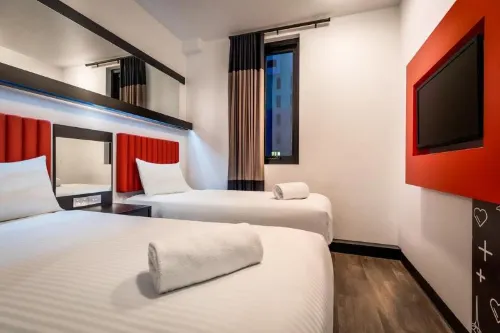 Essence Hotel Carlton Zimmer Photos