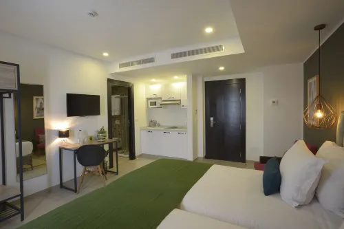 Maia Hotel Suites Rooms Photos
