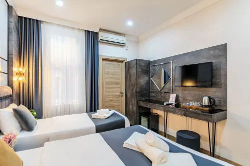 La Pazza Suites Camere Photos