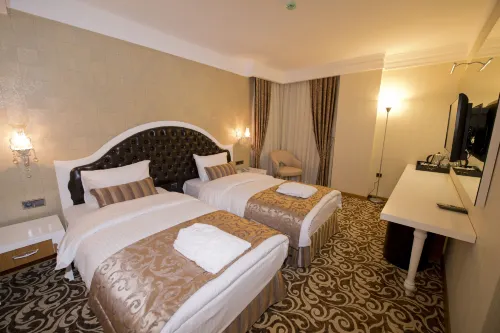 Golden Deluxe Hotel Chambres Photos