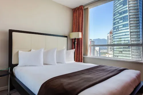 Carmana Hotel & Suites Rooms Photos