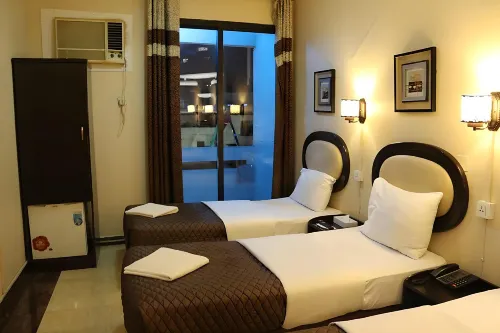 Grand Sina Hotel Rooms Photos
