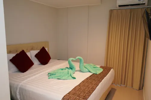 Aruuman Hotel Simpang Lima Kamar Photos