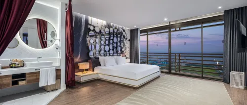 Nirvana Cosmopolitan Hotel - Convention & Sports Center Kamar Photos
