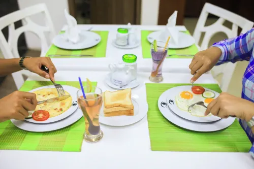 Hotel la Perle Ăn uống Photos