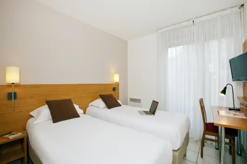 Appart Hôtel - Séjours & Affaires Lyon Park Lane Chambres Photos