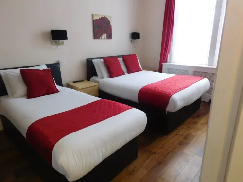 Whites Hotel Camere Photos