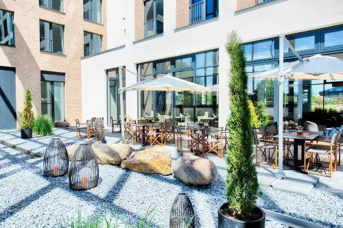 LOGINN Hotel Leipzig By ACHAT Öffentliche Flächen Photos