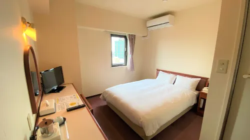 Smile Hotel Kitaasaka Kamar Photos