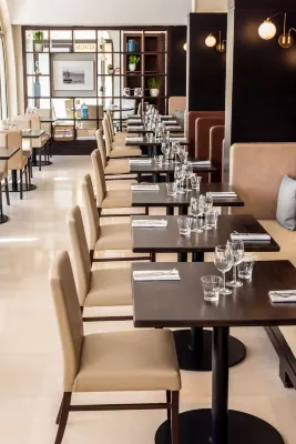 Columbus Hotel Monte-Carlo, Curio Collection by Hilton Dining Photos
