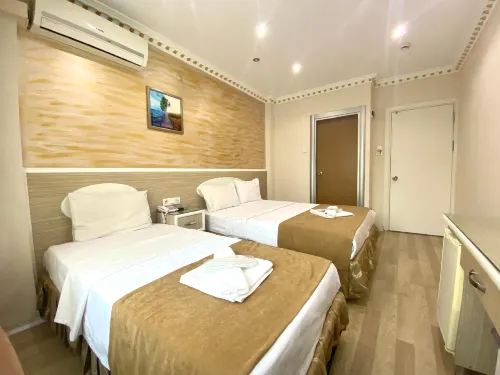 Grand Oral Hotel Rooms Photos