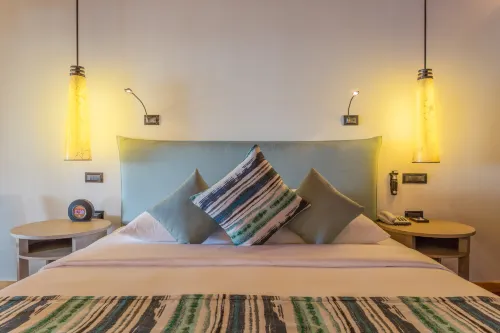 Vilamendhoo Island Resort & Spa Zimmer Photos