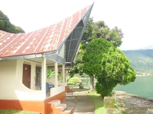 Tuk Tuk Timbul Bungalows Extérieur Photos