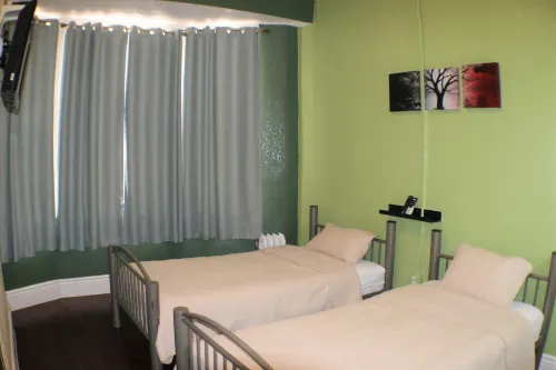 Orange Village Hostel Chambres Photos