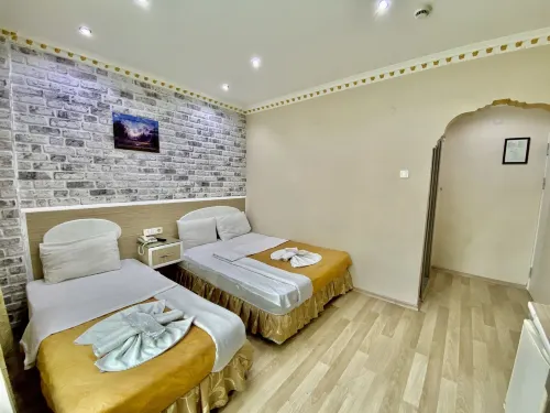 Grand Oral Hotel Rooms Photos