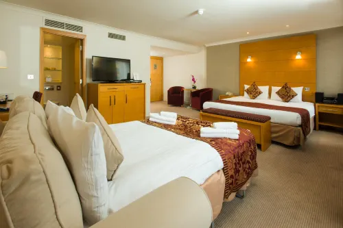 The Park City Grand Plaza Kensington Hotel Camere Photos