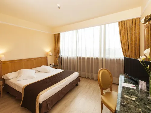 SHG Hotel De La Ville Camere Photos