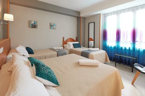 Hotel Sanchez Rooms Photos