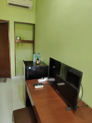 Berlian Beach Inn Kuta Kamar Photos