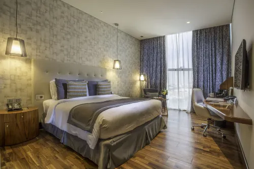 The Avenue Hotel Zimmer Photos
