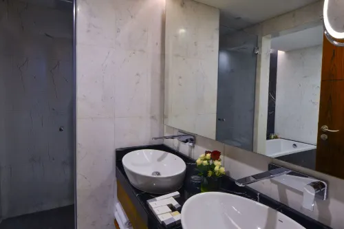 The Avenue Hotel Zimmer Photos