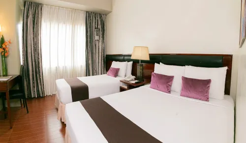 Allure Hotel & Suites Rooms Photos