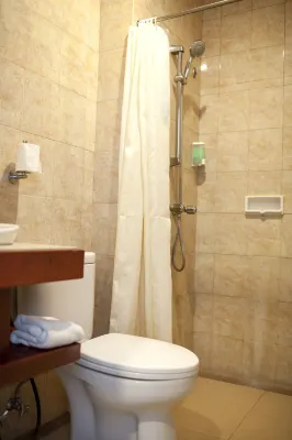 Grand Kuta Hotel and Residence Номера Photos