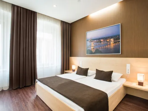 Promenade City Hotel Rooms Photos