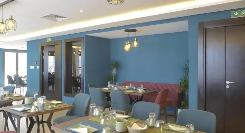 Maia Hotel Suites Dining Photos